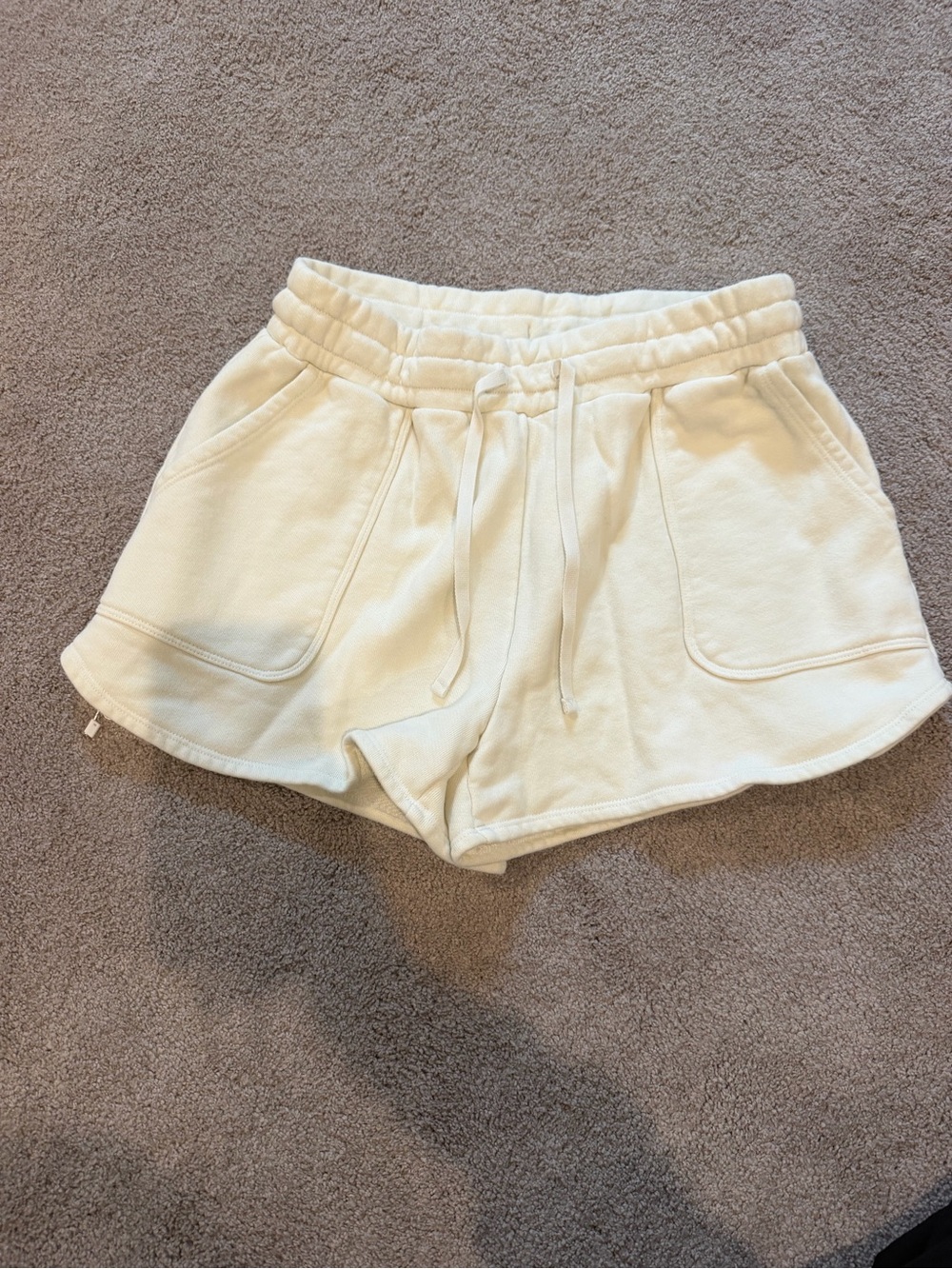 Beyond Yoga Cream Drawstring Pocket Athletic Shorts